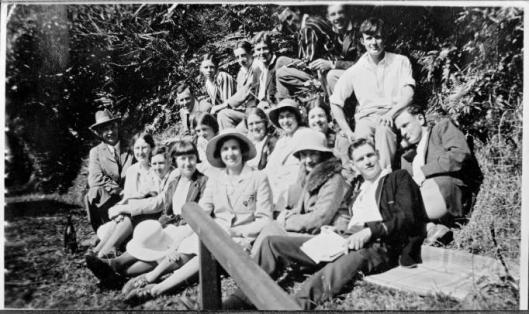 University of Otago Latin picnic at Whare Flat, 1932. Dan Davin is on the far right, with Angus Ross in front of him. Other students include Frank Hall (back left), Winnie McQuilkan (centre front) and Ida Lawson (in dark jacket behind her). The Classics staff, Prof Thomas Dagger Adams and Mary Turnbull, are at front left. Image courtesy of Alexander Turnbull Library, Ref: 1/2-166716-F. http://natlib.govt.nz/records/22884184 