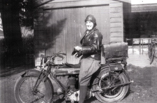Margaret Foster-Barham on the 1926 Triumph 500cc motorbike she rode from Nelson to Otago. Image courtesy of Judy Hogg.