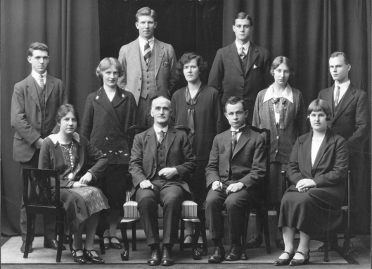 The physics staff and senior students in 1926. Seated are (from left) lecturer Agnes Blackie, Professor Robert Jack and Robert Nimmo, who was about to head to England for postgraduate research and would eventually succeed Jack as professor. Everybody has signed their name on the back of the photo, but I haven't been able to match all the names and faces. Others include Helen Thomson, Phyllis Sutton, Allan Harrington, James Horn, William Somerville and Harold Taylor, who would all graduate BSc in 1927, plus Doris Wheatley and Evelyn Franklin. Later departmental photos show Agnes Blackie surrounded by men, but physics was clearly less of a male bastion in 1926! Image courtesy of the Hocken Collections, Department of Physics archives, MS-3846 Box 2, S06-516.